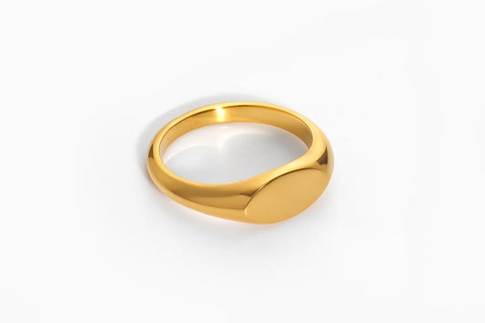 Gold ring on a white background