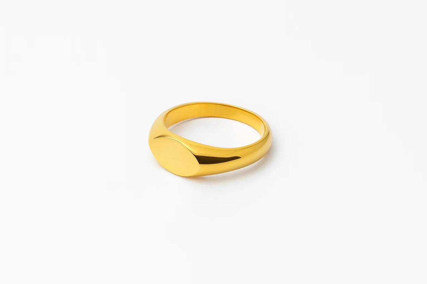 Gold ring on a white background