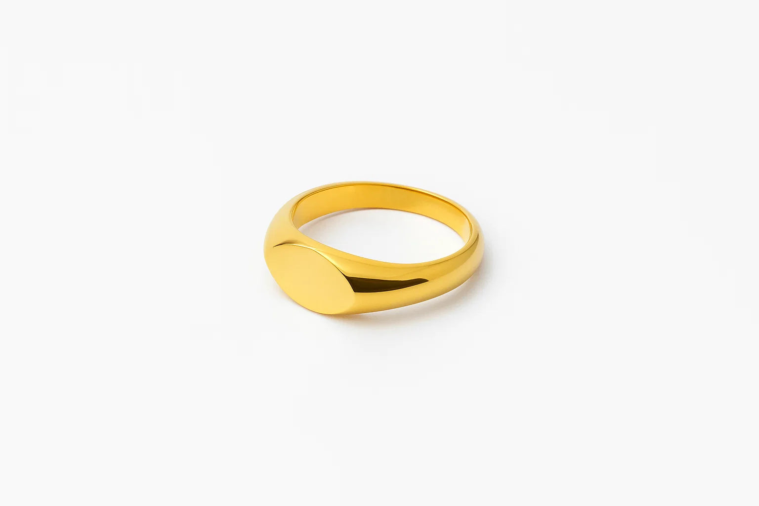 Gold ring on a white background